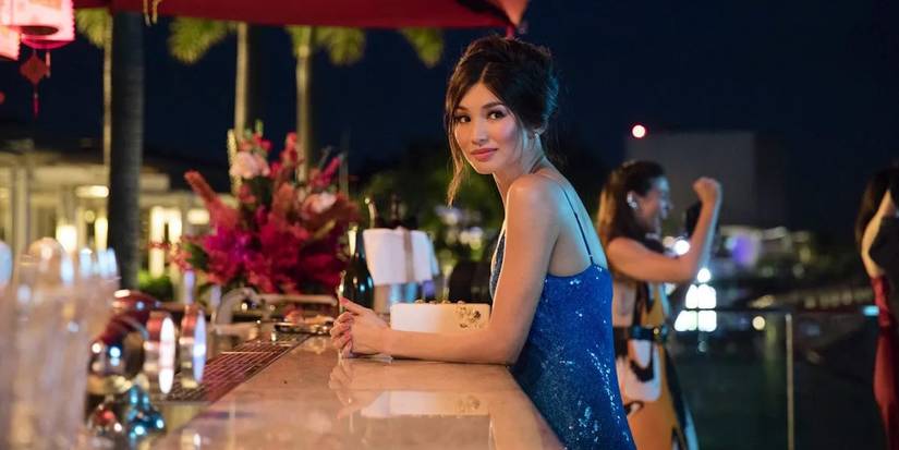 Gemma Chan as Astrid smiling from across the bar in Crazy Rich Asians