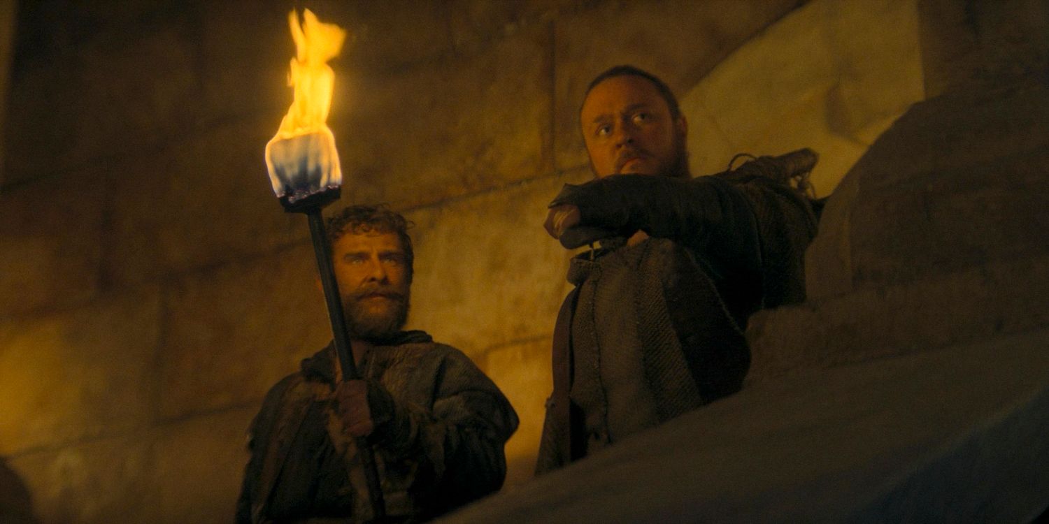 Cheese (Mark Stobbart) and Blood (Sam C. Wilson) secretly enter the Red Keep castle in House of the Dragon season 2 episode 1