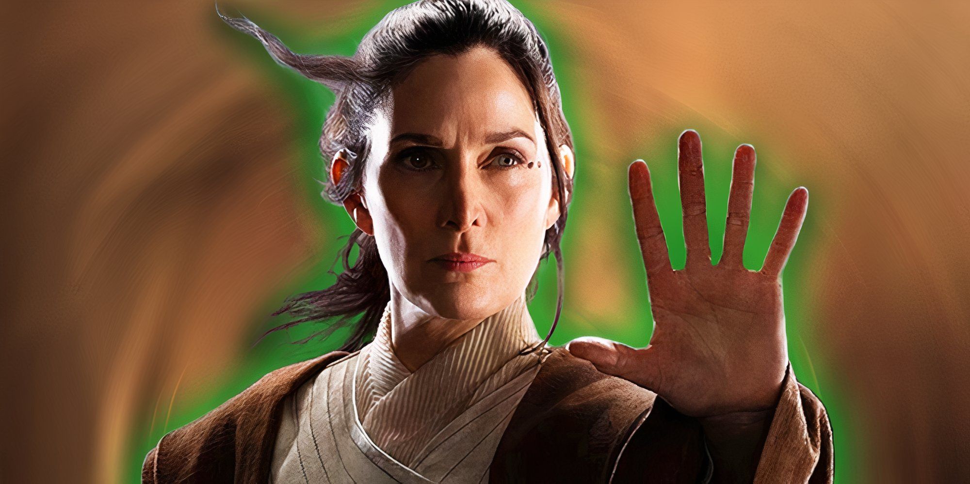 Carrie-Anne Moss' Master Indara holds her hand up to use the Force