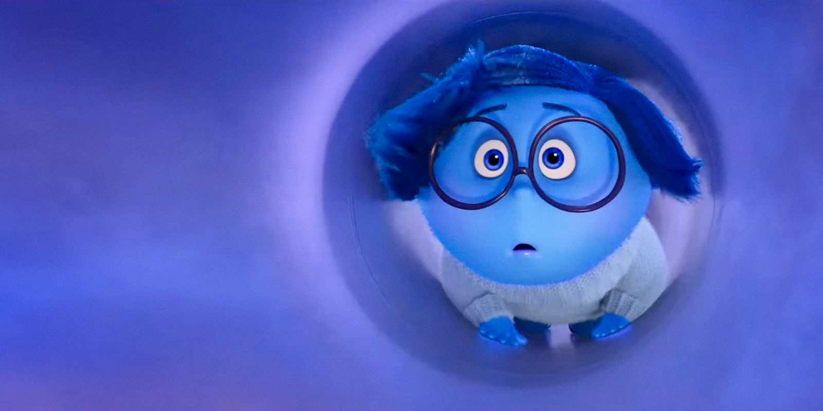 Sadness traveling at high speed through the tube that transports memories in Inside Out 2