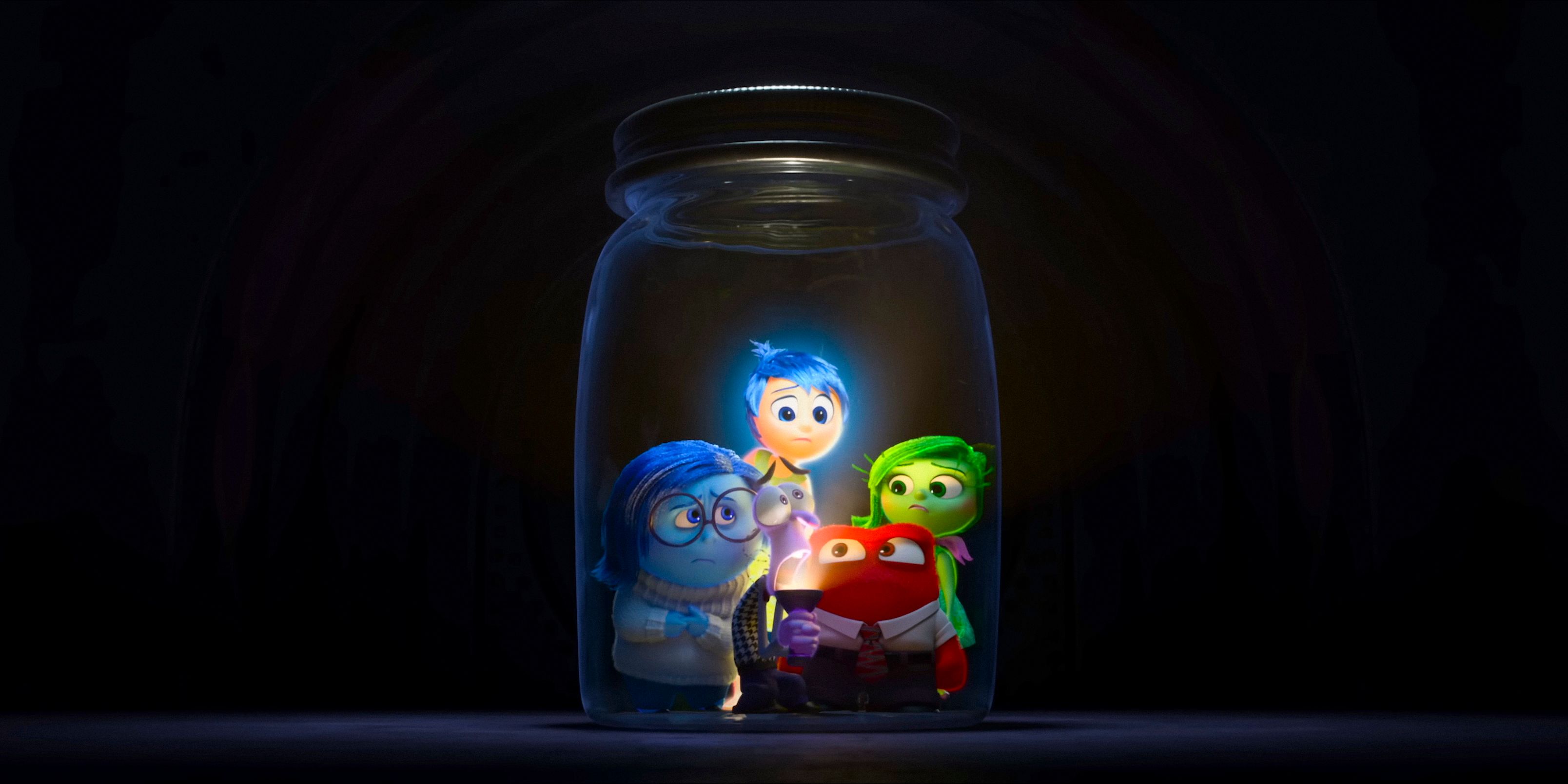 Joy, Sadness, Fear, Anger, and Disgust trapped in a jar in Inside Out 2