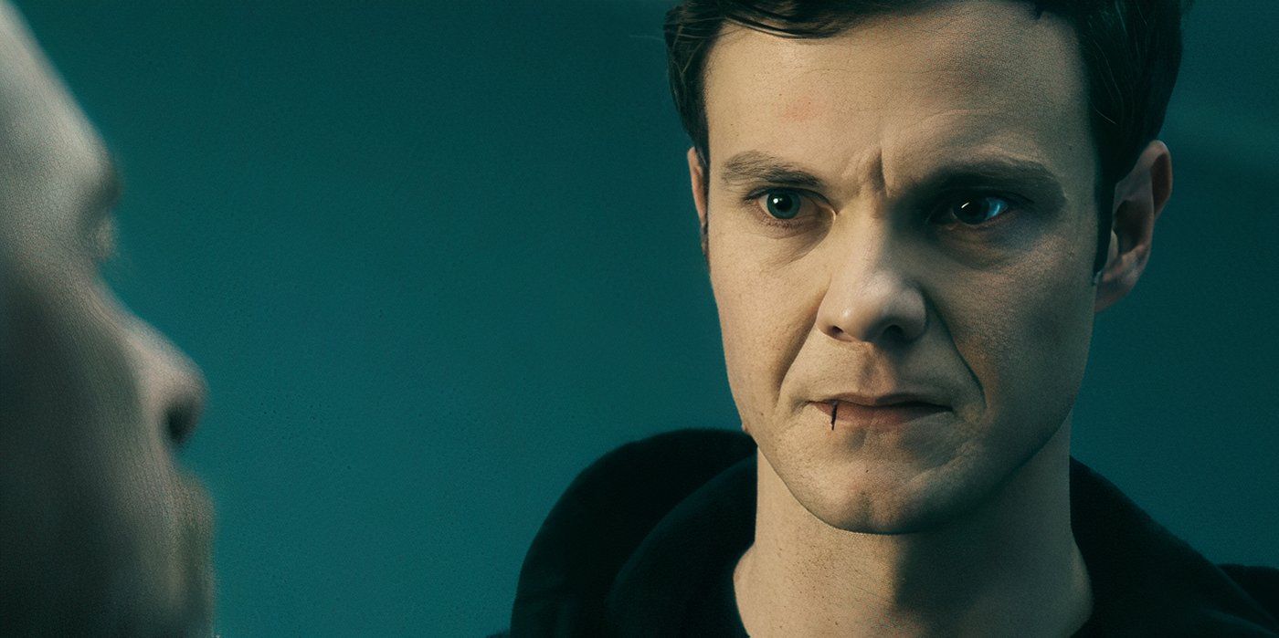 Jack Quaid as Hughie looking at his dad in a hospital bed in The Boys.