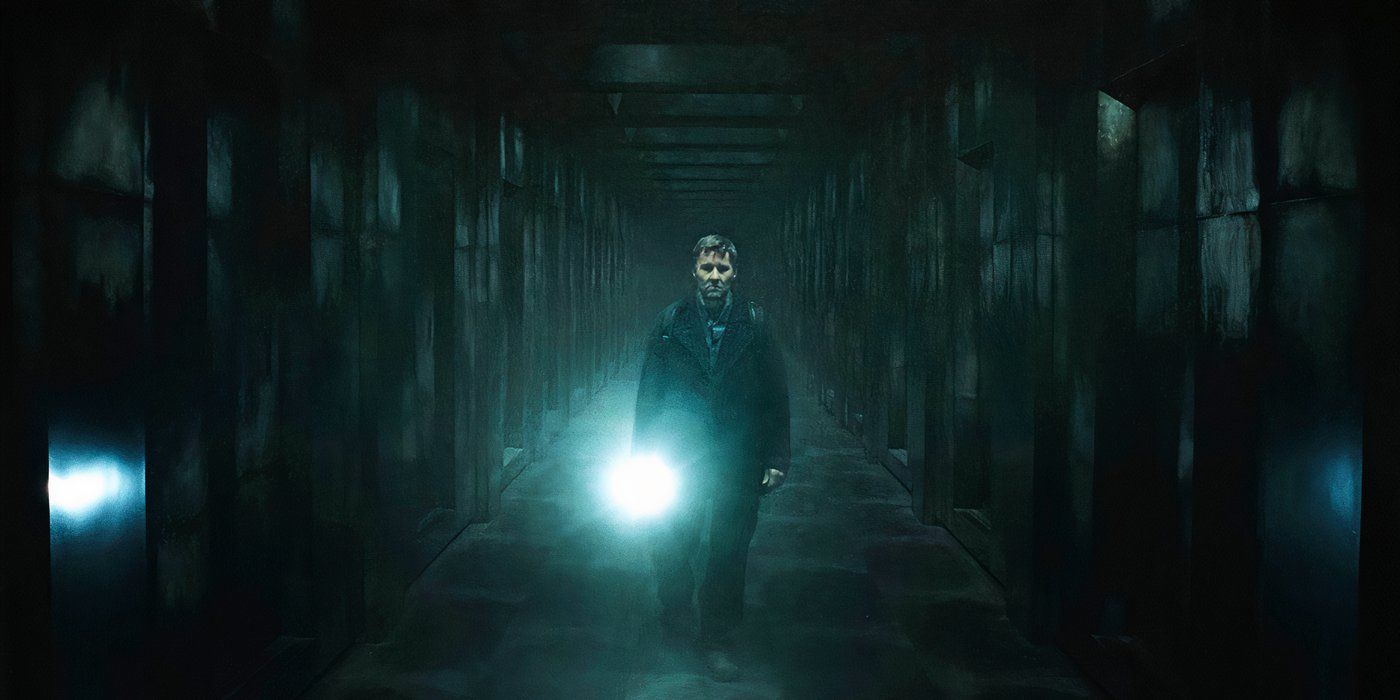Jason1 walks down an endless corridor inside the box in Dark Matter