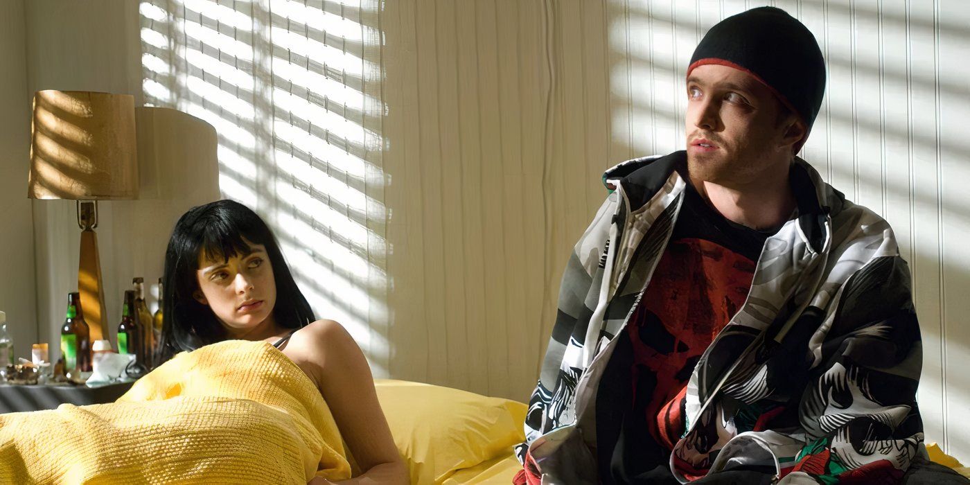 Jesse Pinkman (Aaron Paul) and Jane (Krysten Ritter) sitting in bed in Breaking Bad.