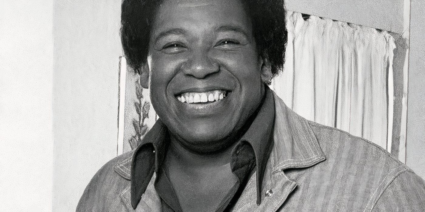 Johnny Brown como Nathan Bookman rindo e sorrindo em Good Times.