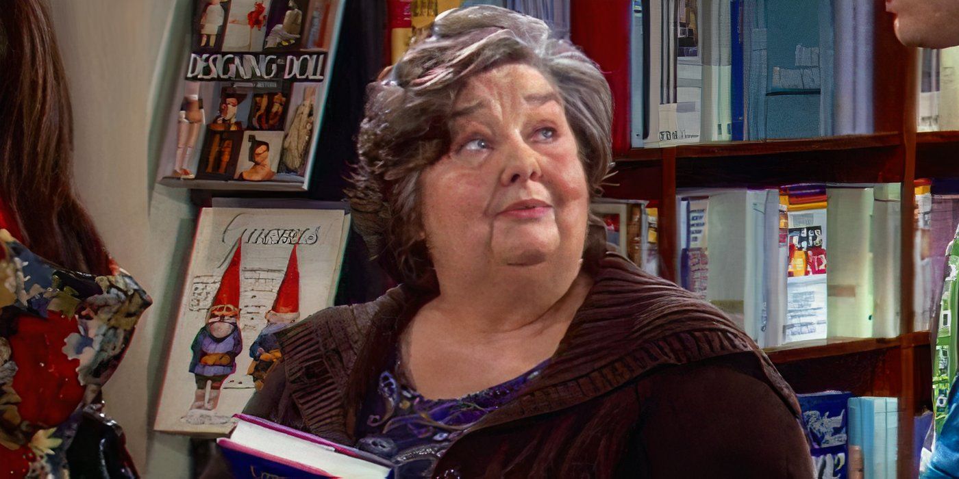 Lilian Adler (Jane Galloway Heitz) holding a book and looking up in Glee.