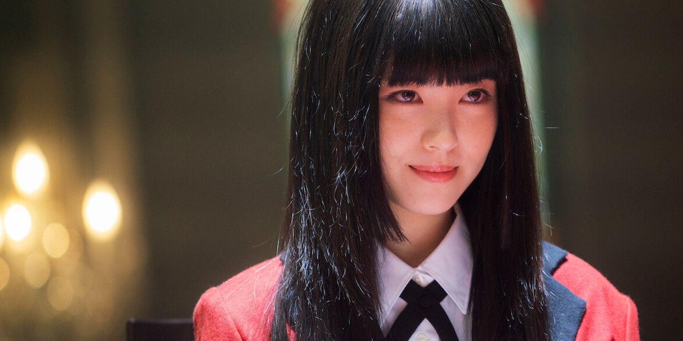 Minami Hamabe as Yumeko Jabami smiling in the live-action Kakegurui