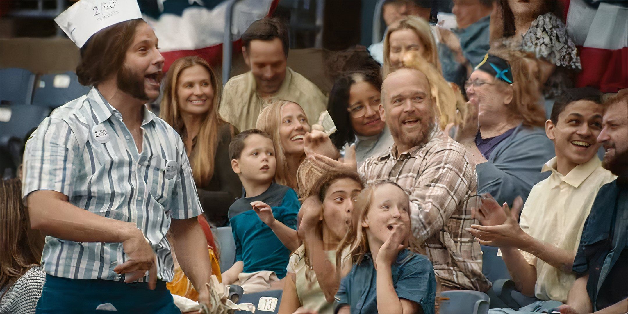 Logan Marshall-Green as Ted selling peanuts at a baseball game in Reverse the Curse