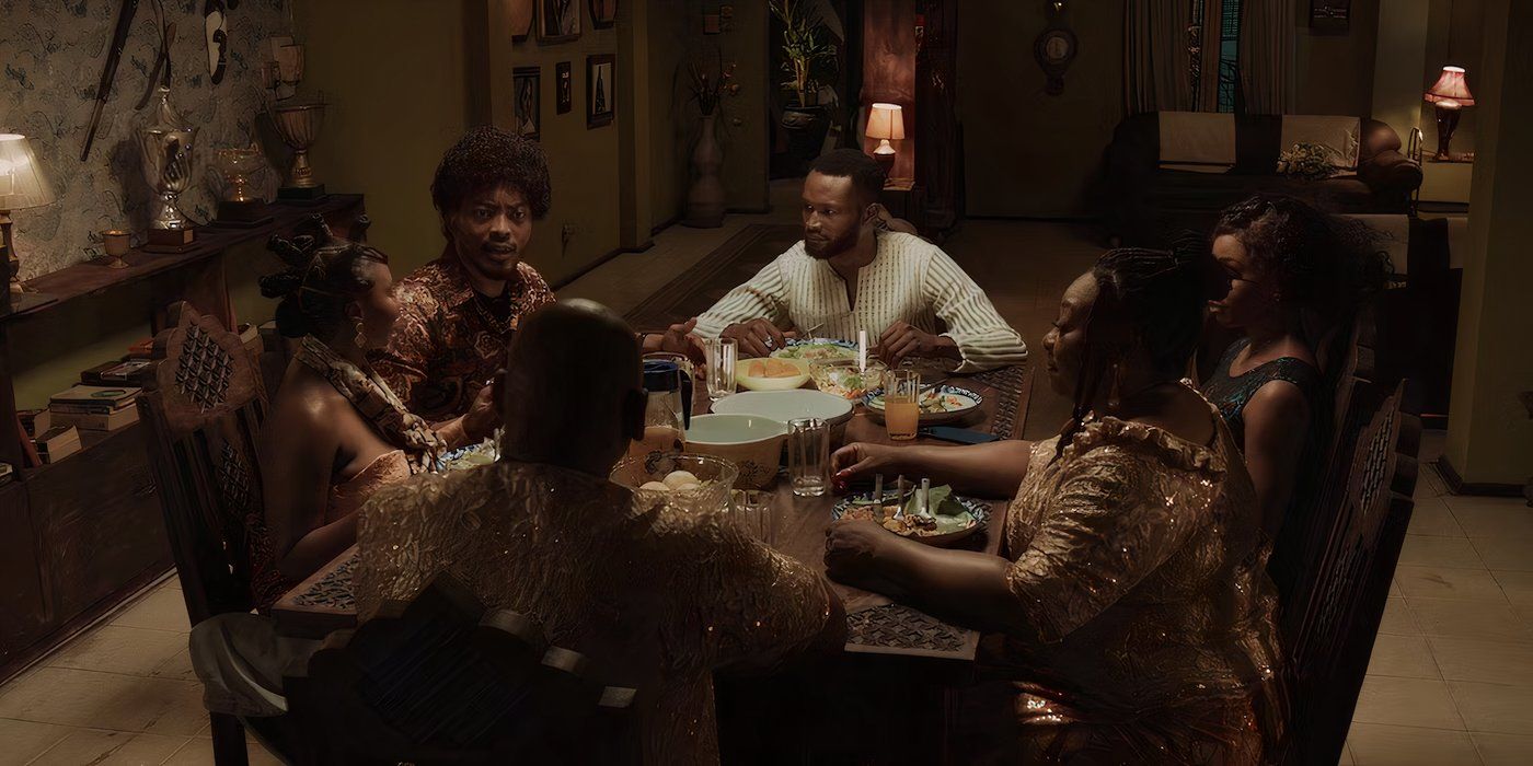 Luc's family sits around the dinner table together