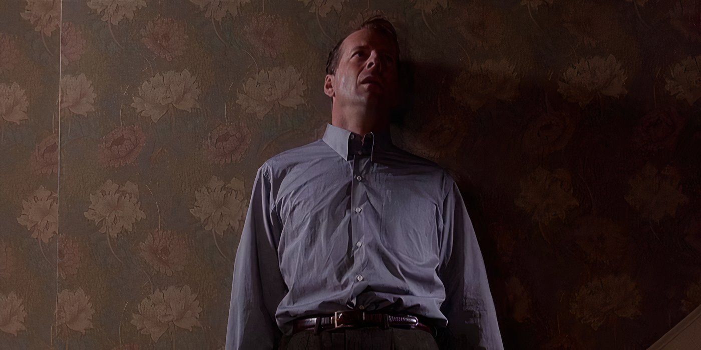 Malcolm leaning against a wall in The Sixth Sense