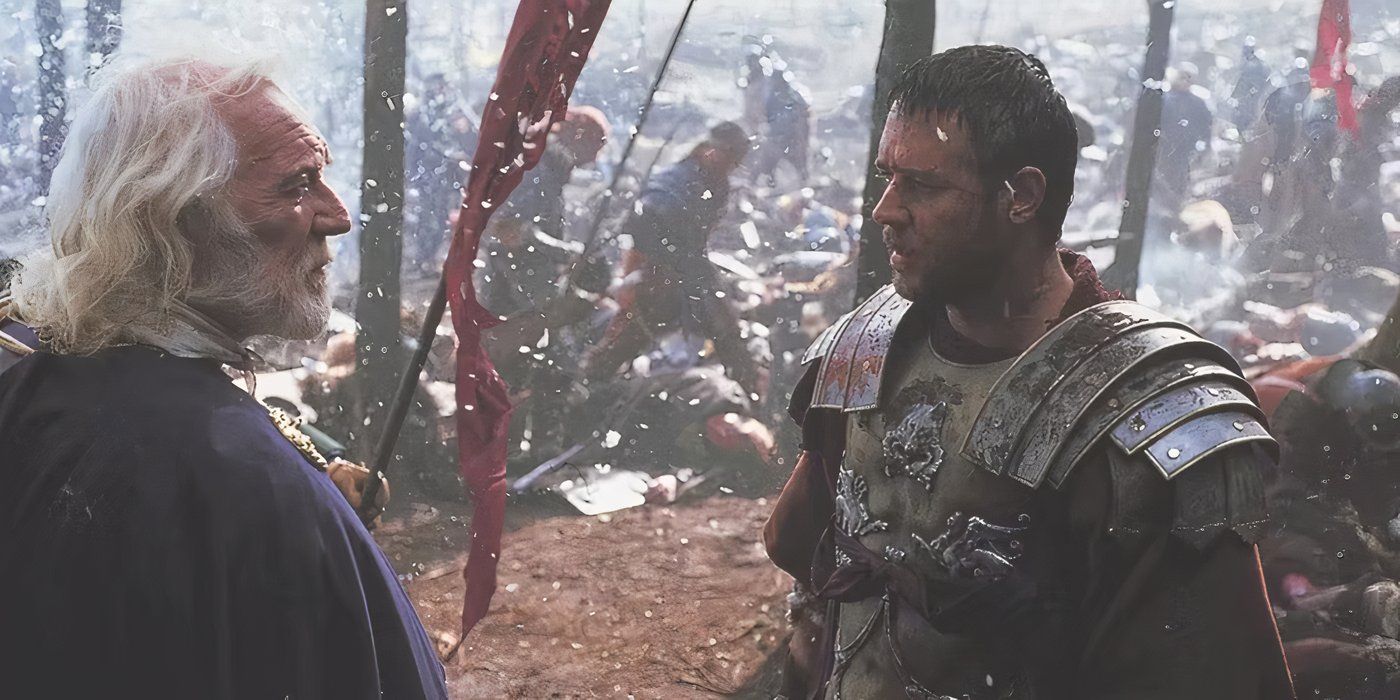 Marcus Aurelius (Richard Harris) and Maximus (Russell Crowe) speak in the snow in Gladiator