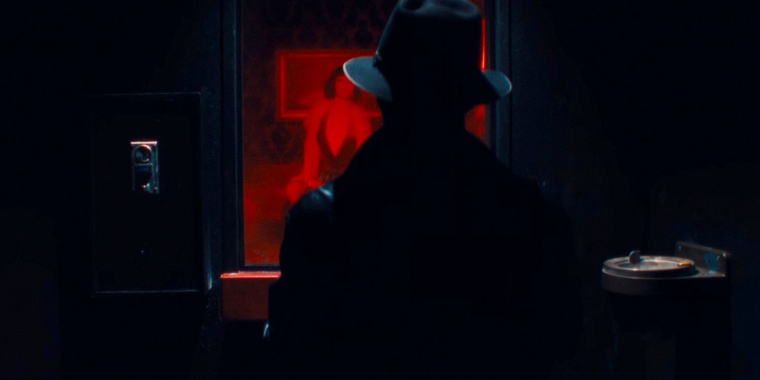 the silhouette of a mysterious man wearing a hat watching a woman through a window in MaXXXine (2024) 
