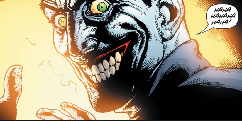 Joker laughs in front of fire