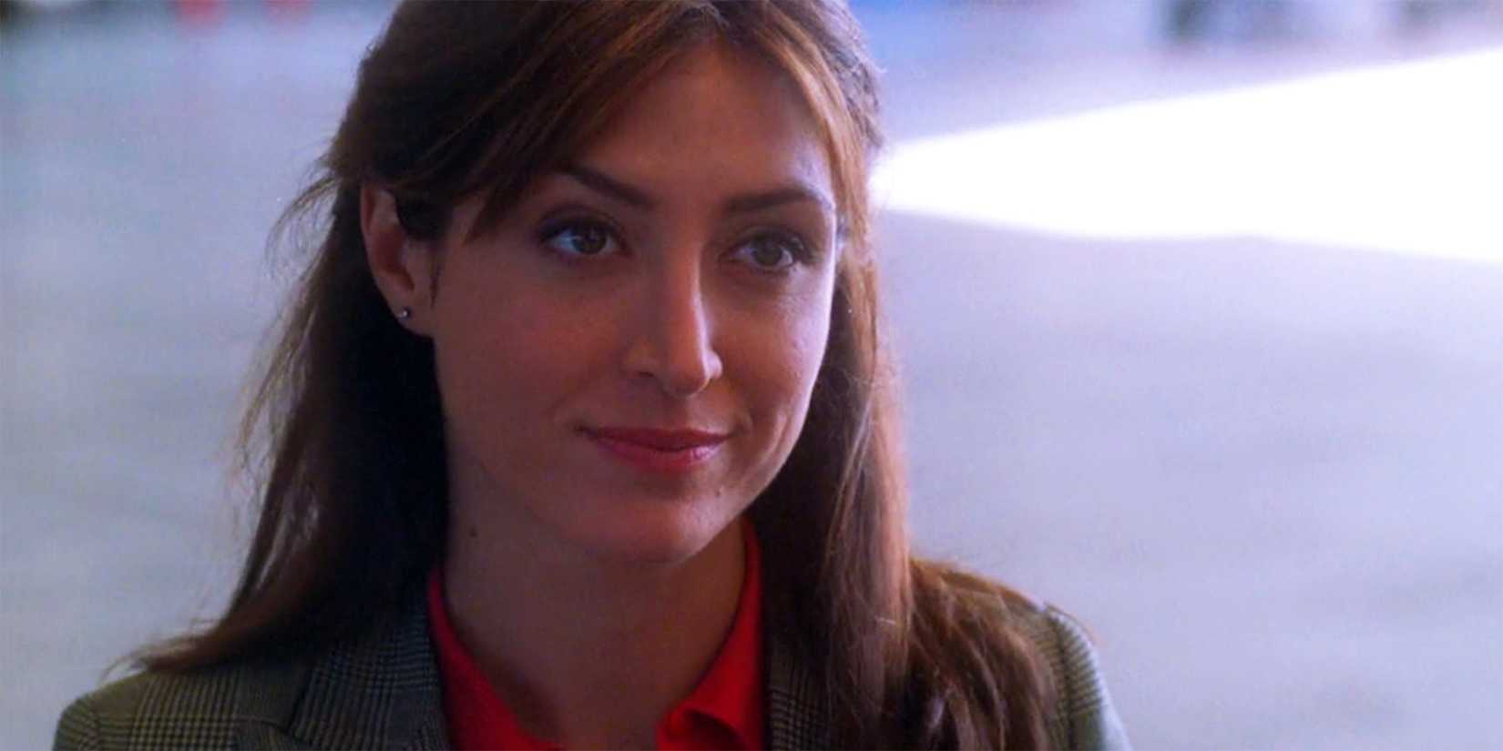 Caitlin Todd (Sasha Alexander) smiling in closeup in NCIS