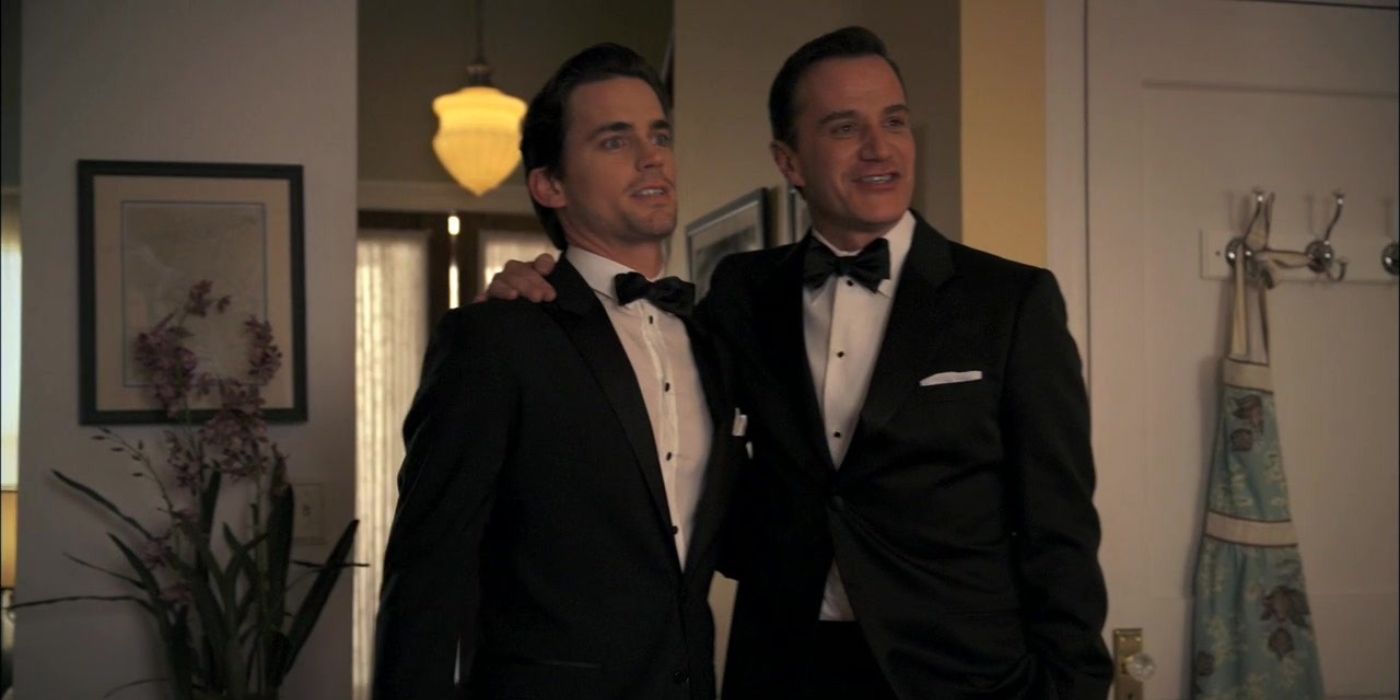 Neal and Peter posing in suits in White Collar. 