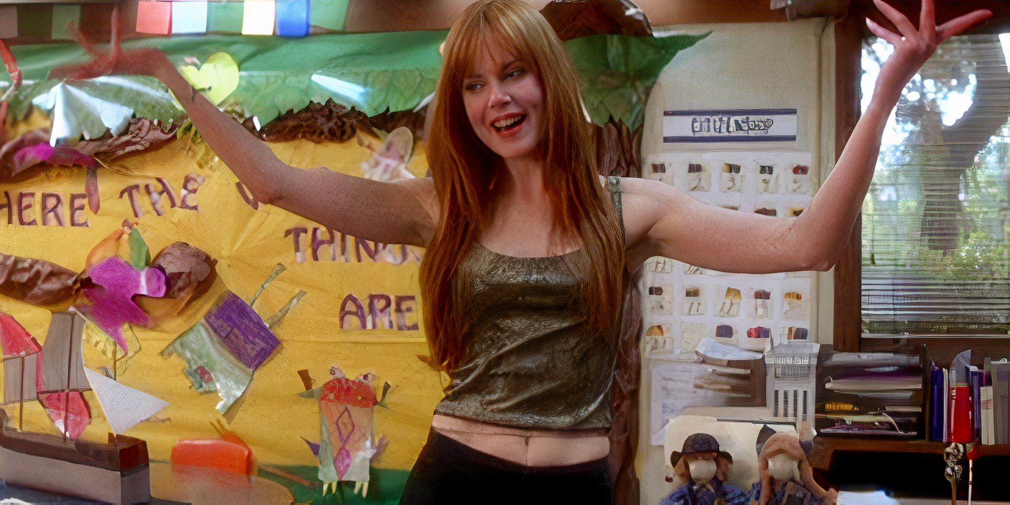 Nicole Kidman throwing her hands up as Gilly in a classroom in Practical Magic