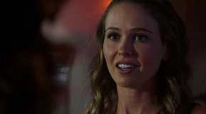 Novak smiling as she talks to someone in Chicago Fire
