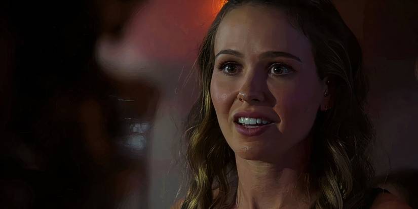 Novak smiling as she talks to someone in Chicago Fire