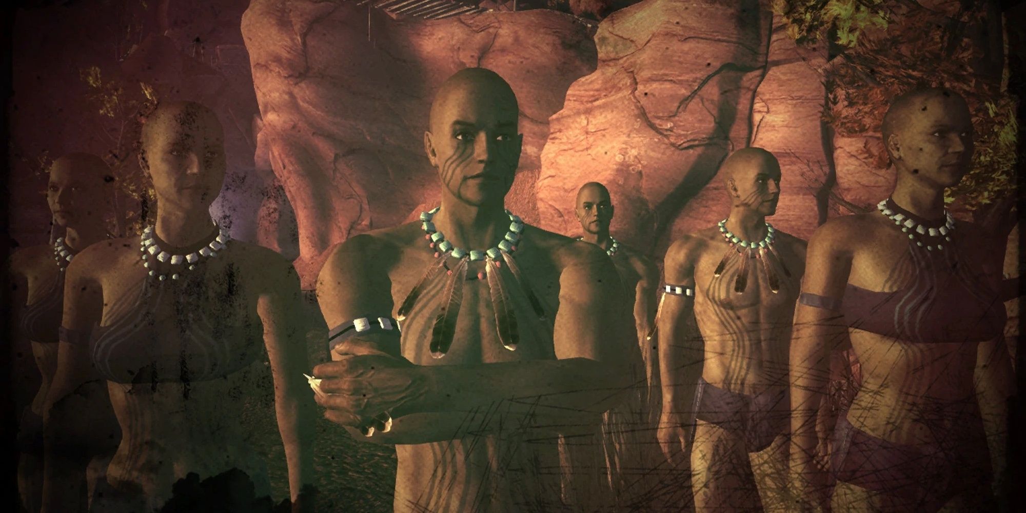 O slide final da tribo Sorrows de New Vegas, mostrando um grupo de pessoas da tribo sem camisa e com colares de penas. 