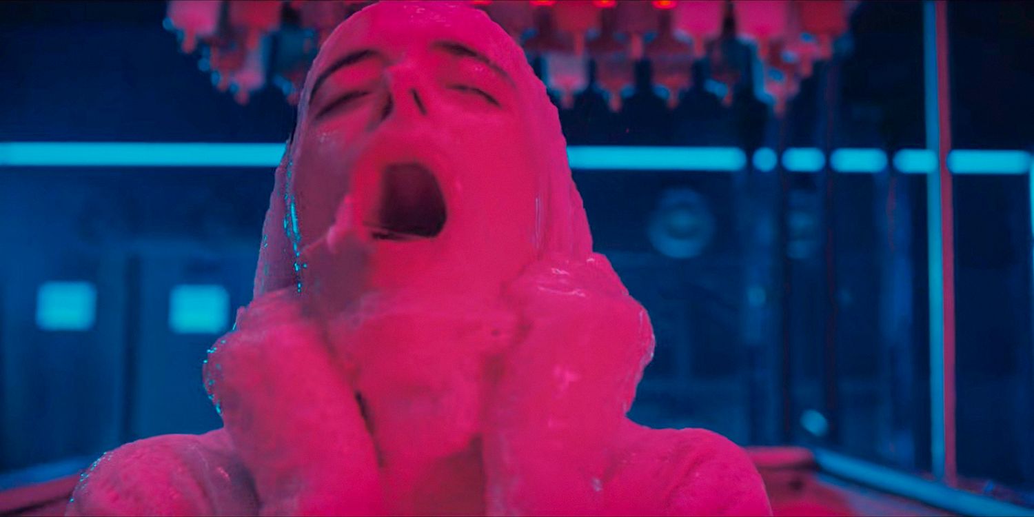 Lucy (Krysten Ritter) emerging from a pink liquid after being 3D printed in Orphan Black: Echoes