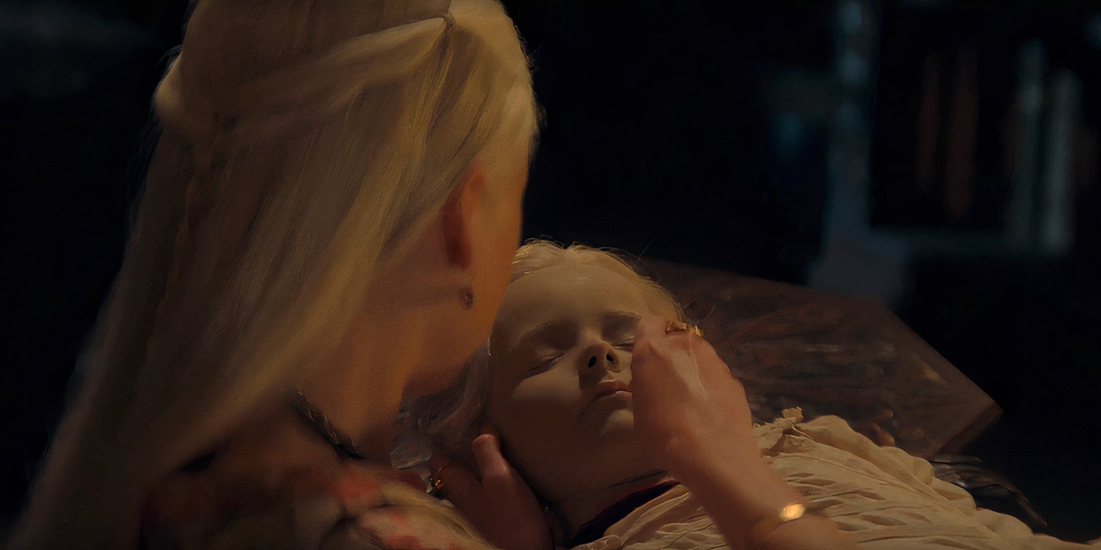 Prince Jaehaerys' head being sewn on by Milly Alcock's Rhaenyra in House of the Dragon season 2, episode 3