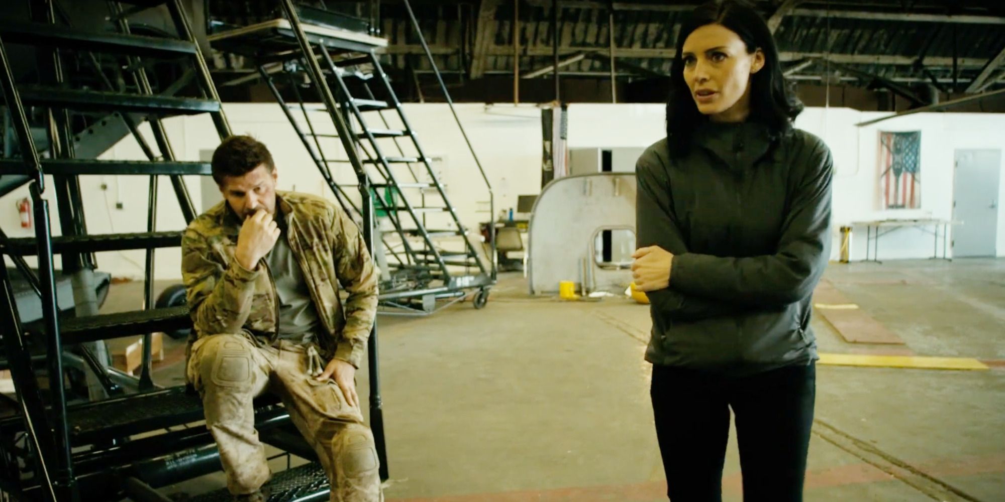  Mandy (Jessica Pare) talks to Jason (David Boreanaz) on SEAL Team