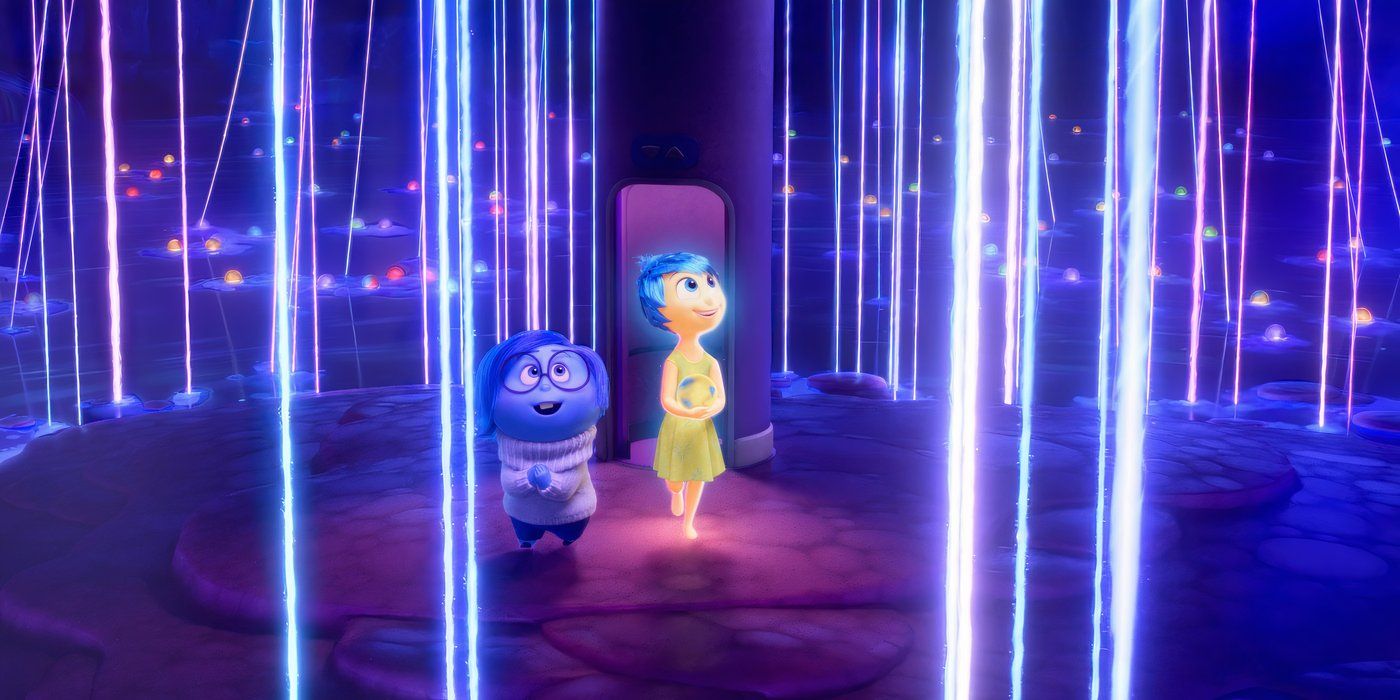 Sadness and Joy walk through long strands of light in Inside Out 2
