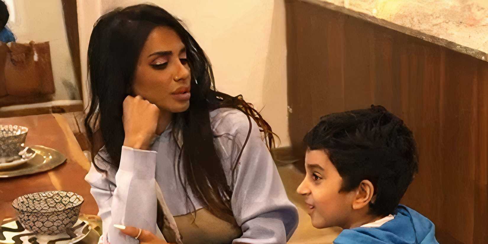 Sara Al Madani and son at table on RHODubai