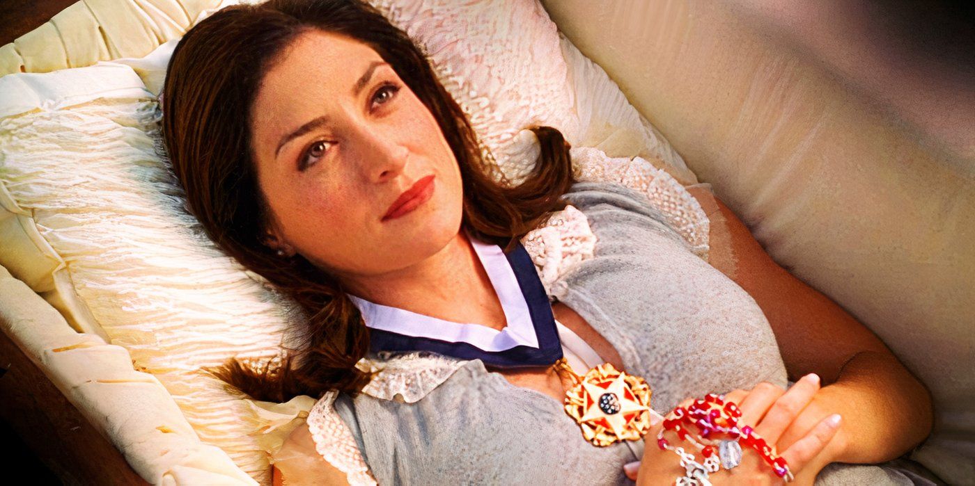 Sasha Alexander as Caitlin Todd laying awake in a coffin in NCIS