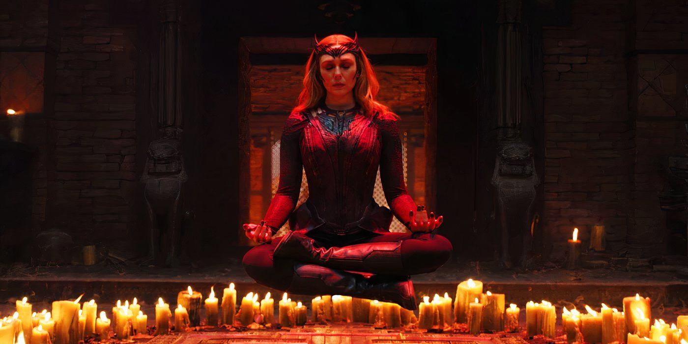 Scarlet Witch surrounded by candles dream-walking in Doctor Strange in the Multiverse of Madness