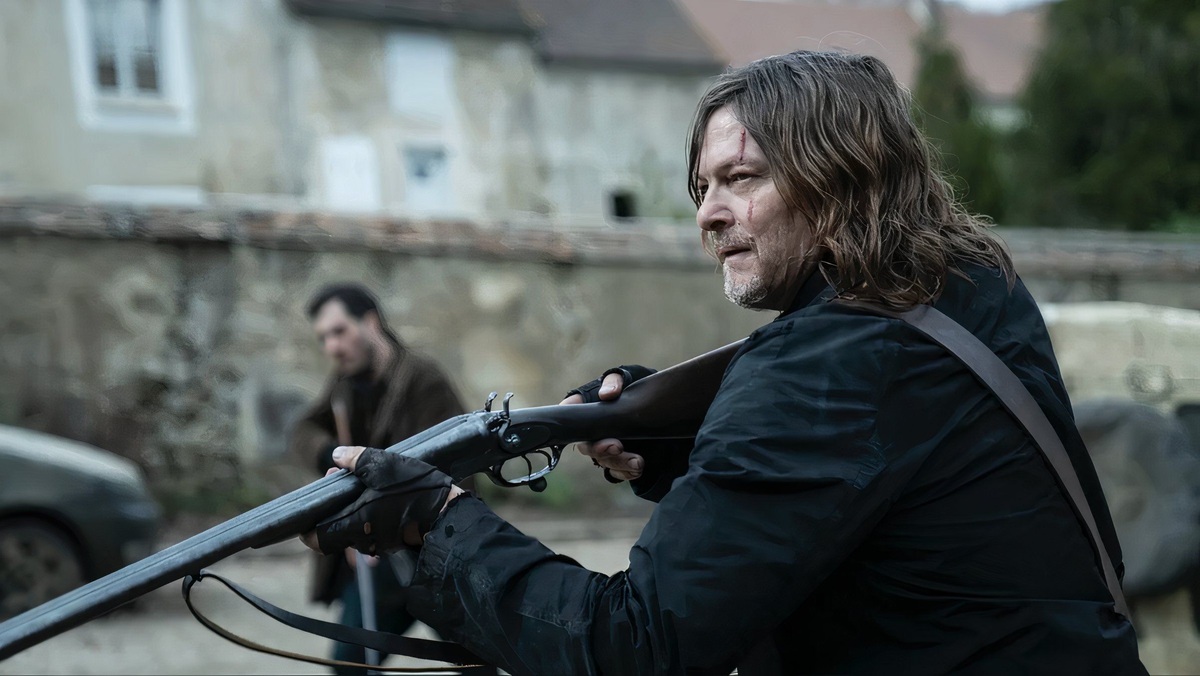 Norman Reedus as Daryl with a shotgun in The Walking Dead Daryl Dixon season 2