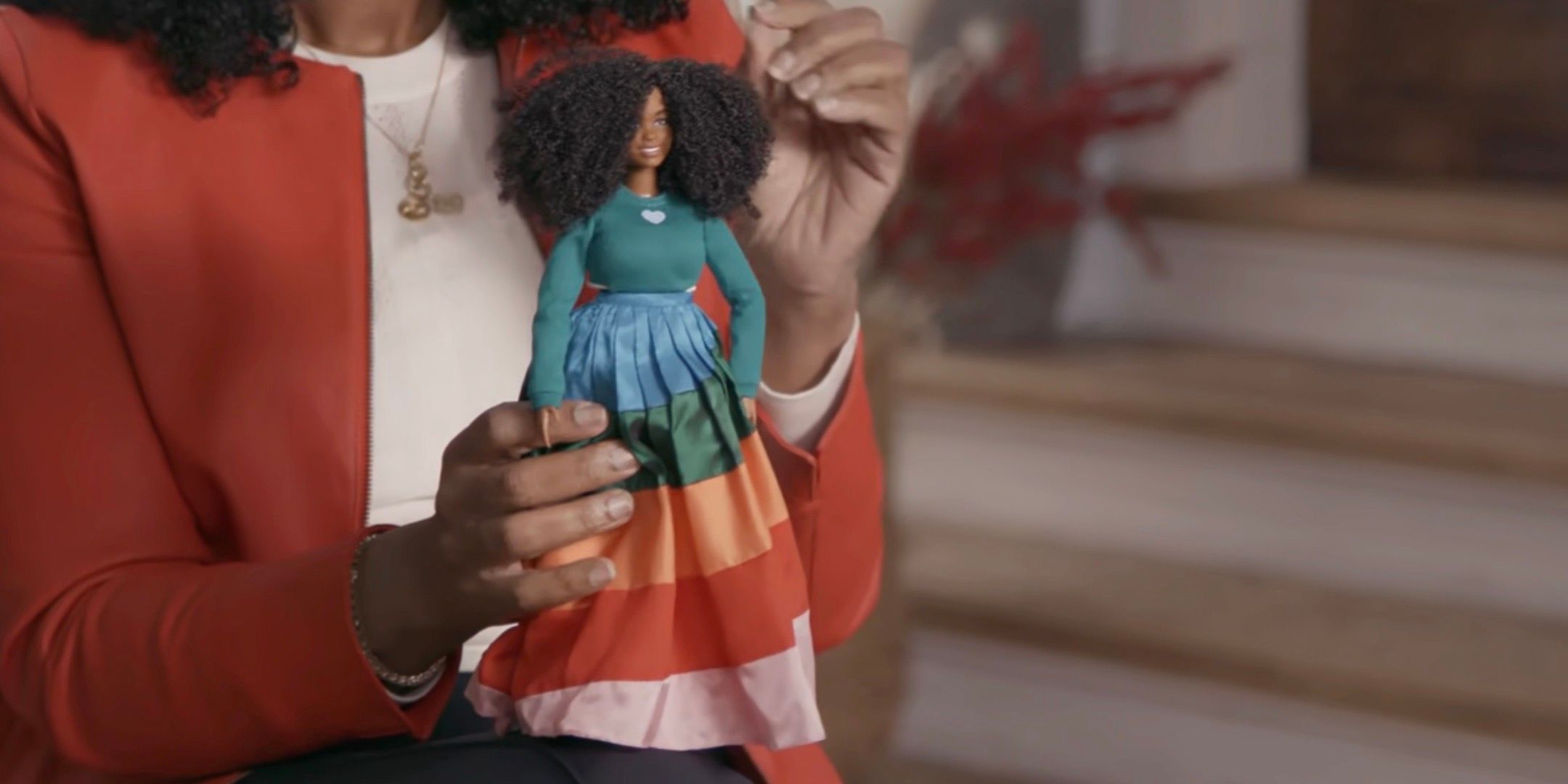 Shonda Rhimes holds her Barbie doll. 