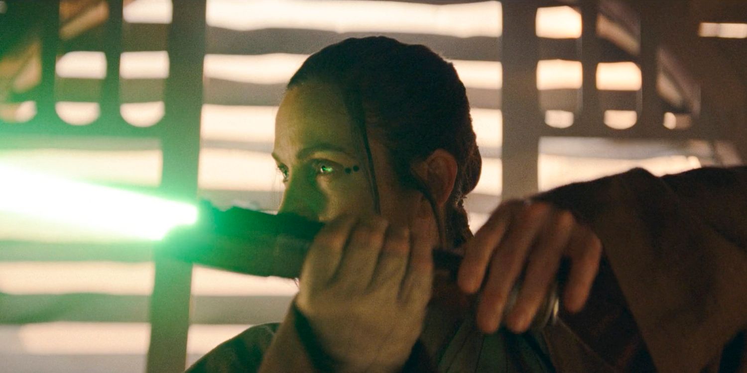 Indara (Carrie-Anne Moss) wielding her lightsaber in The Acolyte Season 1, episode 1