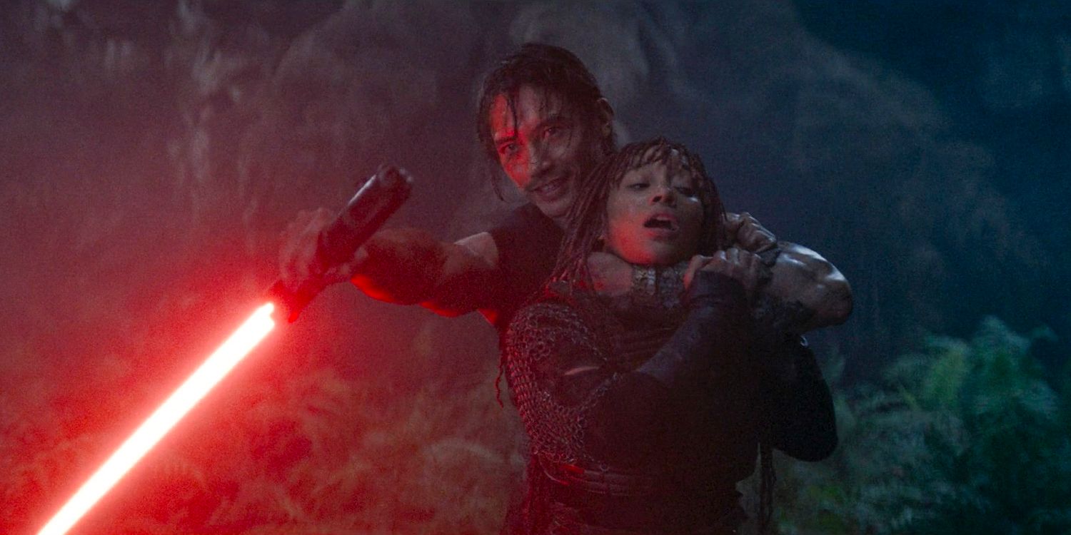 Qimir/Sith (Manny Jacinto) takes Mae (Amandla Stenberg) hostage while threatening Master Sol with his lightsaber in The Acolyte season 1 episode 5