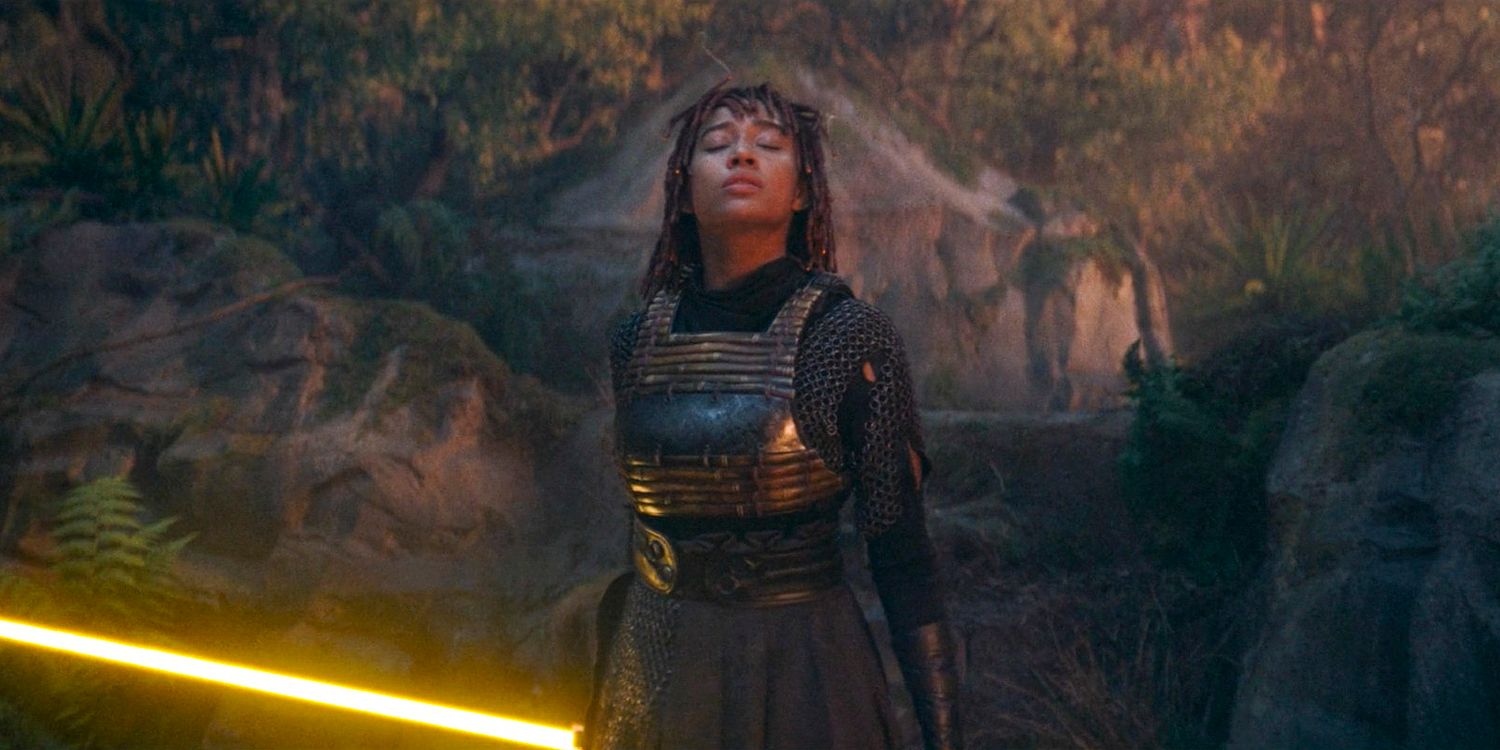 Mae (Amandla Stenberg) cuts her hair with a lightsaber to pretend to be Osha in The Acolyte season 1 episode 5