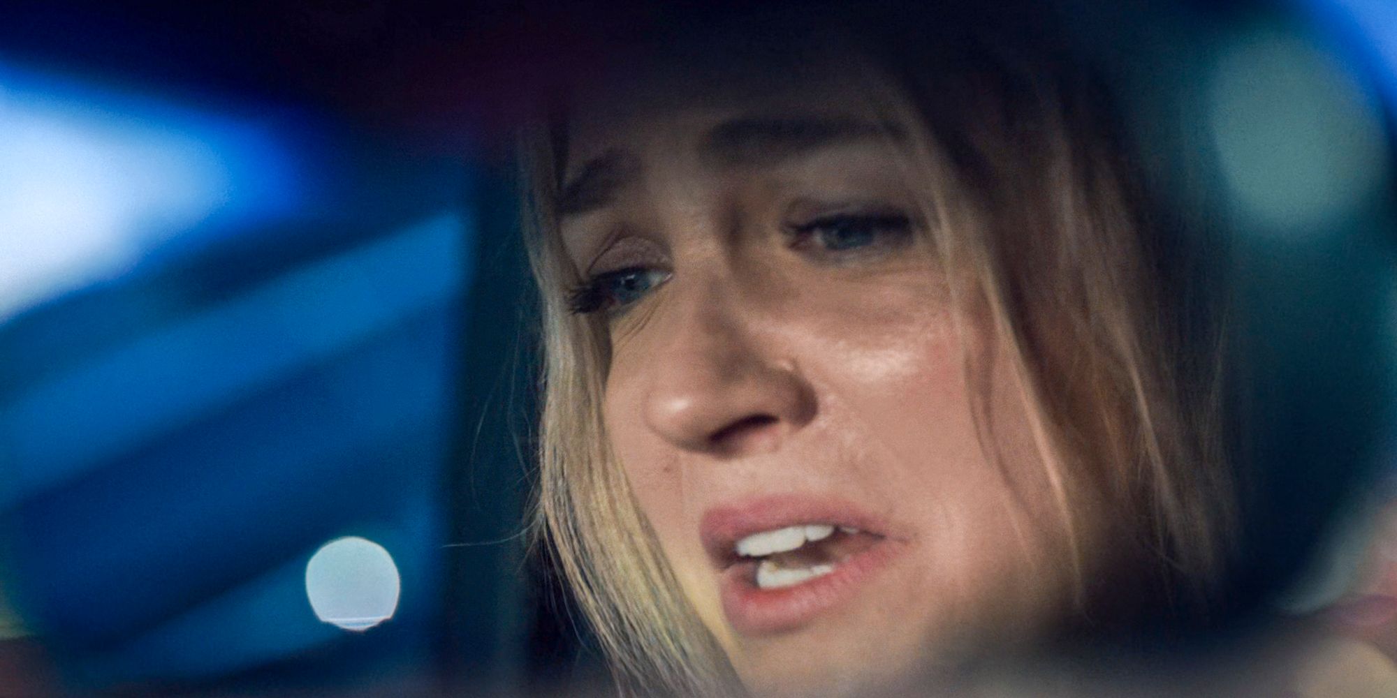 Sugar (Abby Elliott) in her car, stressed because she is about to give birth in The Bear Season 3 Episode 8