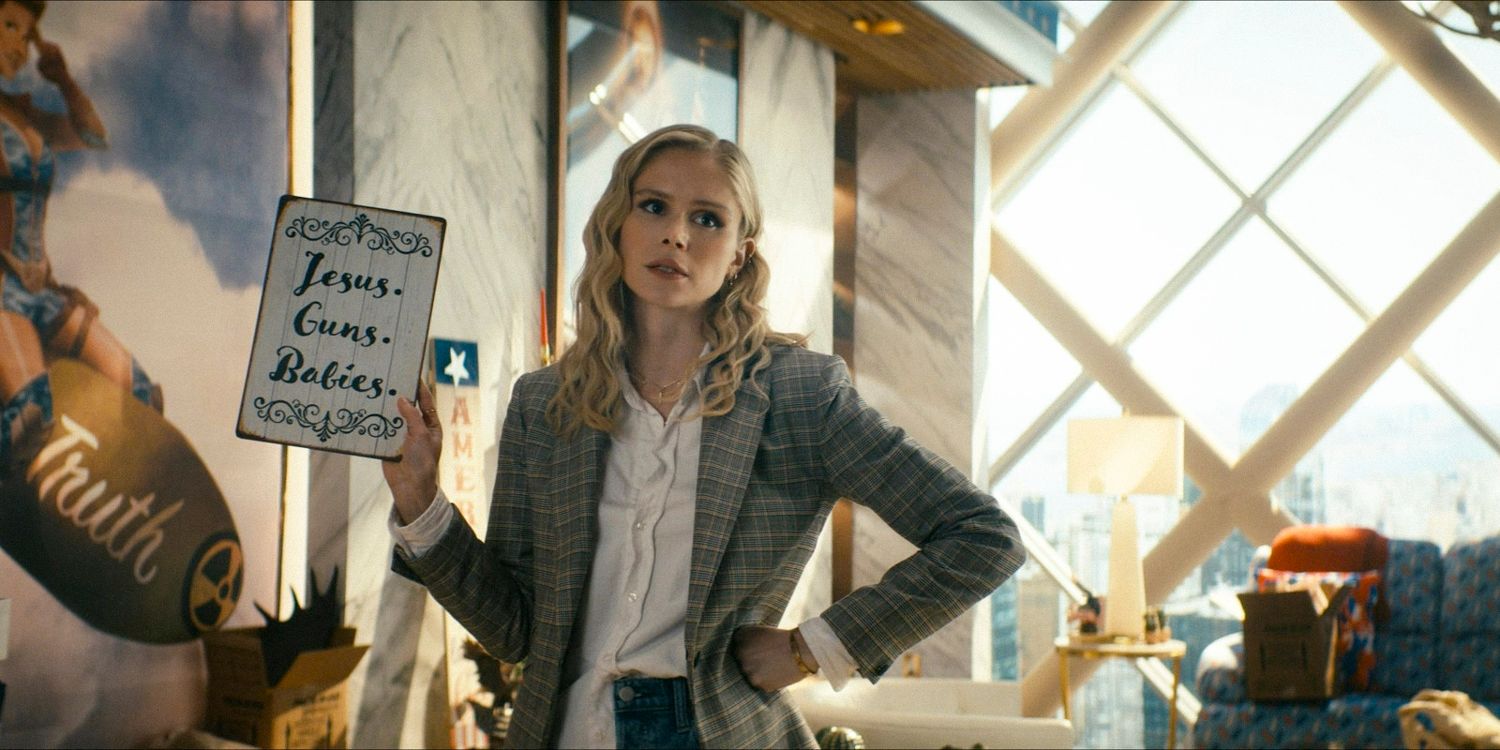Starlight (Erin Moriarty) holding a sign that says "Jesus Guns Babies" in The Boys season 4 episode 3