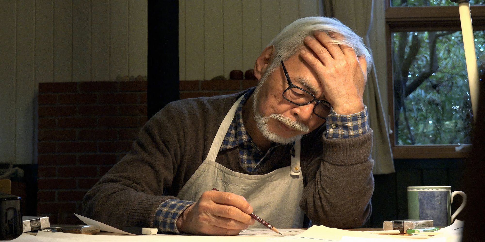 Miyazaki at his desk