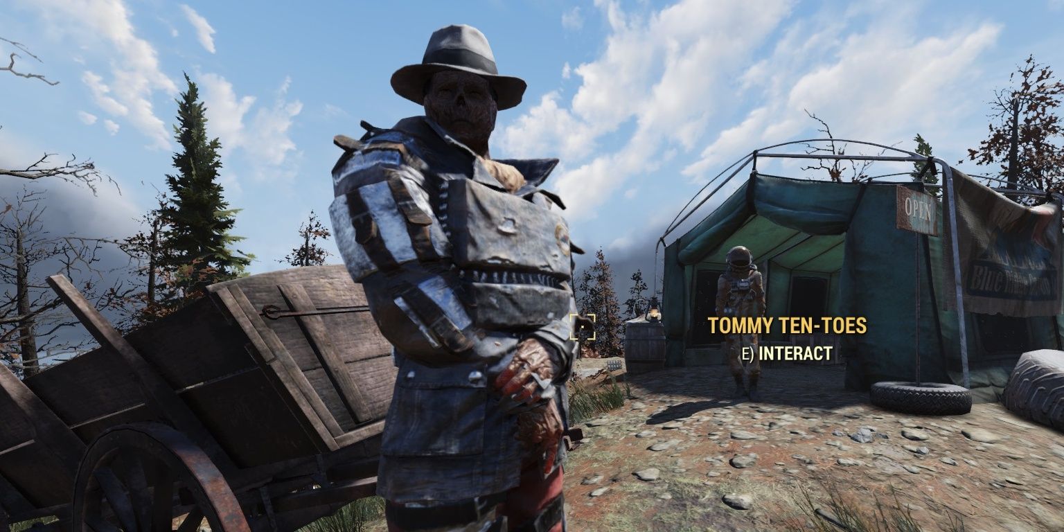 Tommy Ten Toes stands with hands crossed on a hill in Fallout 76.