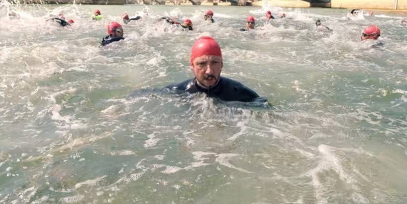 The Triathlon Swimmers in the Water in Under Paris