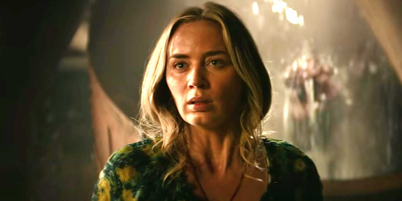 Emily Blunt looking off into the distance in A Quiet Place