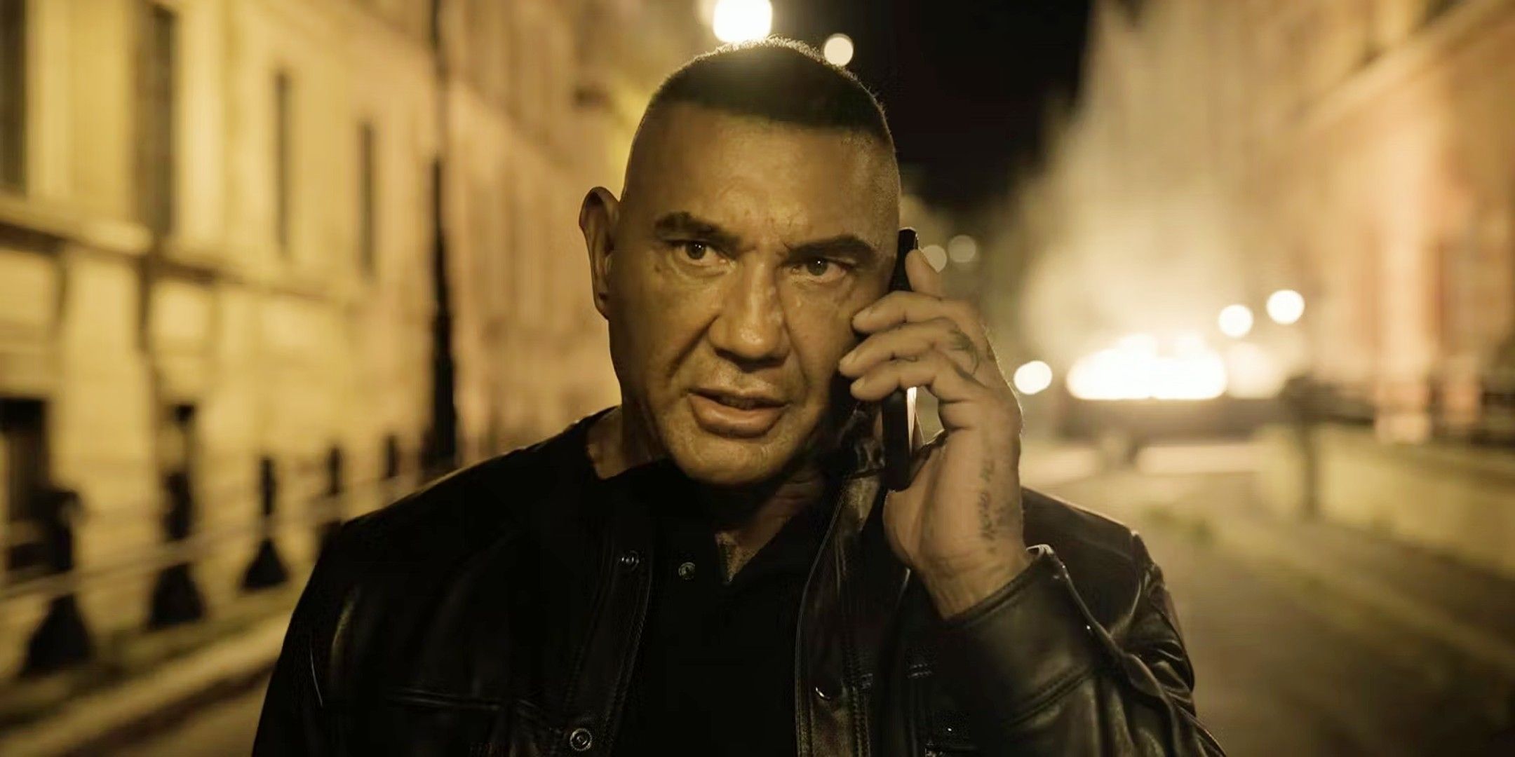 Dave Bautista on the Phone in The Killer's Game