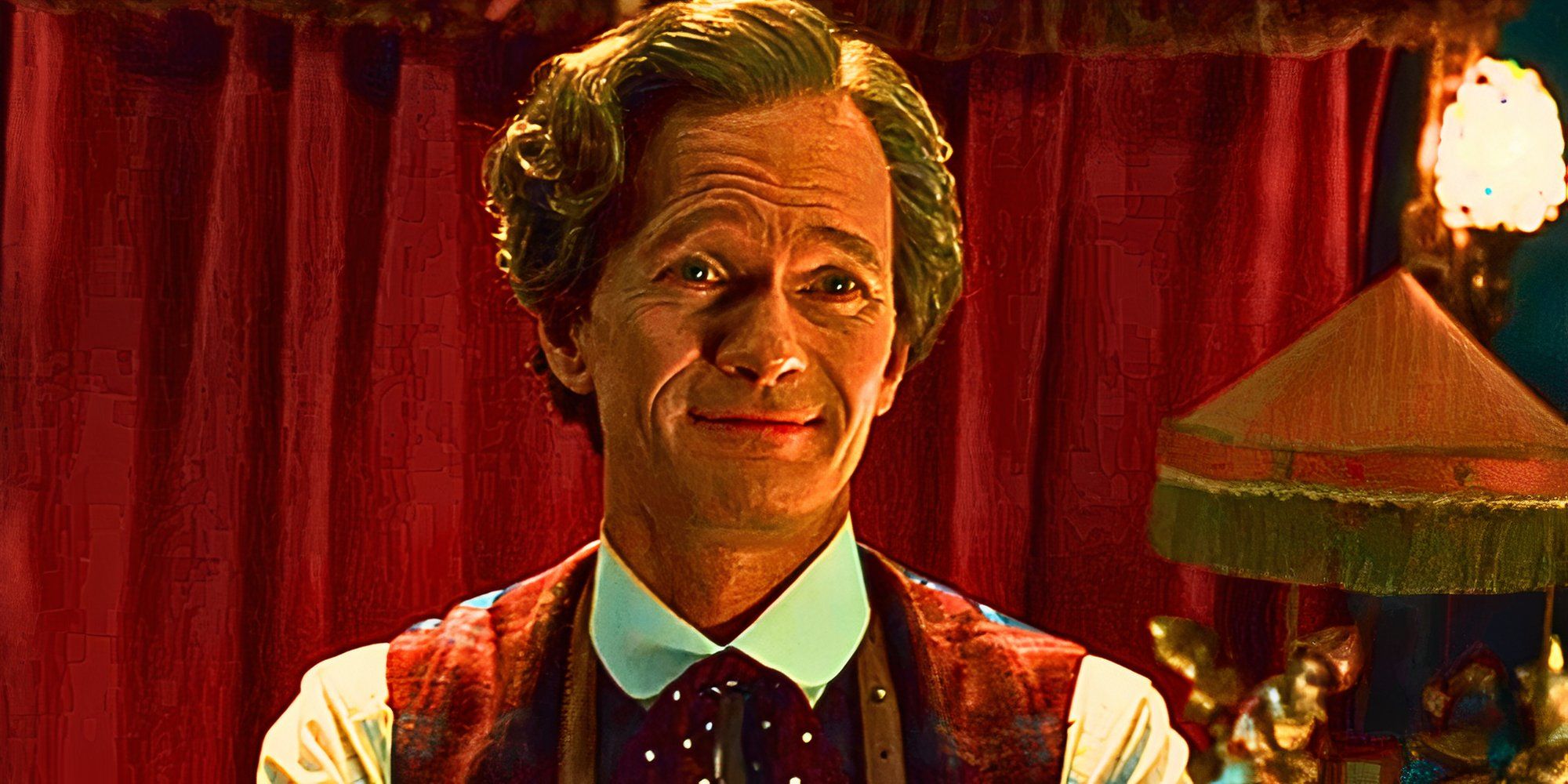 Neil Patrick Harris smiling smugly as the Toymaker in Doctor Who
