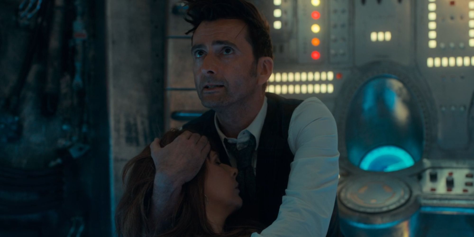 David Tennant as the Fourteenth Doctor cradling the head of Catherin Tate's Donna Noble in Doctor Who