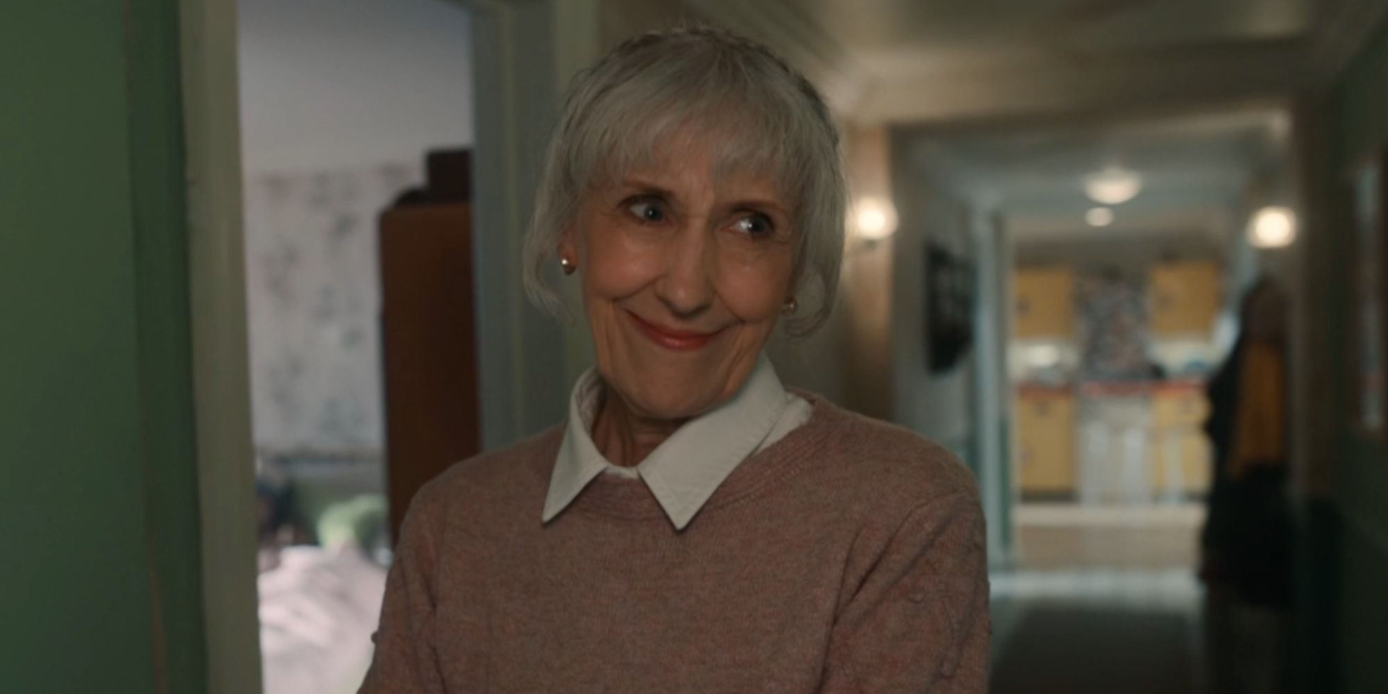 Anita Dobson smiling as Mrs. Flood in Doctor Who
