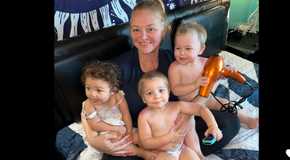 1000-lb Sisters Amanda Halterman, Gage Halterman, Glenn Halterman & a baby cuddled up together posing for a photo