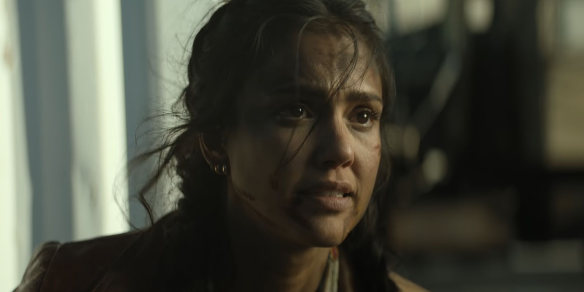Jessica Alba looking battered and worried as Parker in Trigger Warning