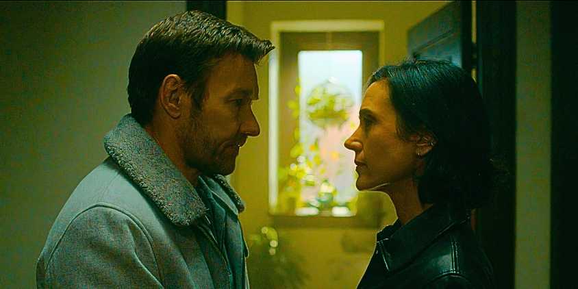 Joel Edgerton as Jason2 and Jennifer Connelly as Daniela looking at each other in Dark Matter