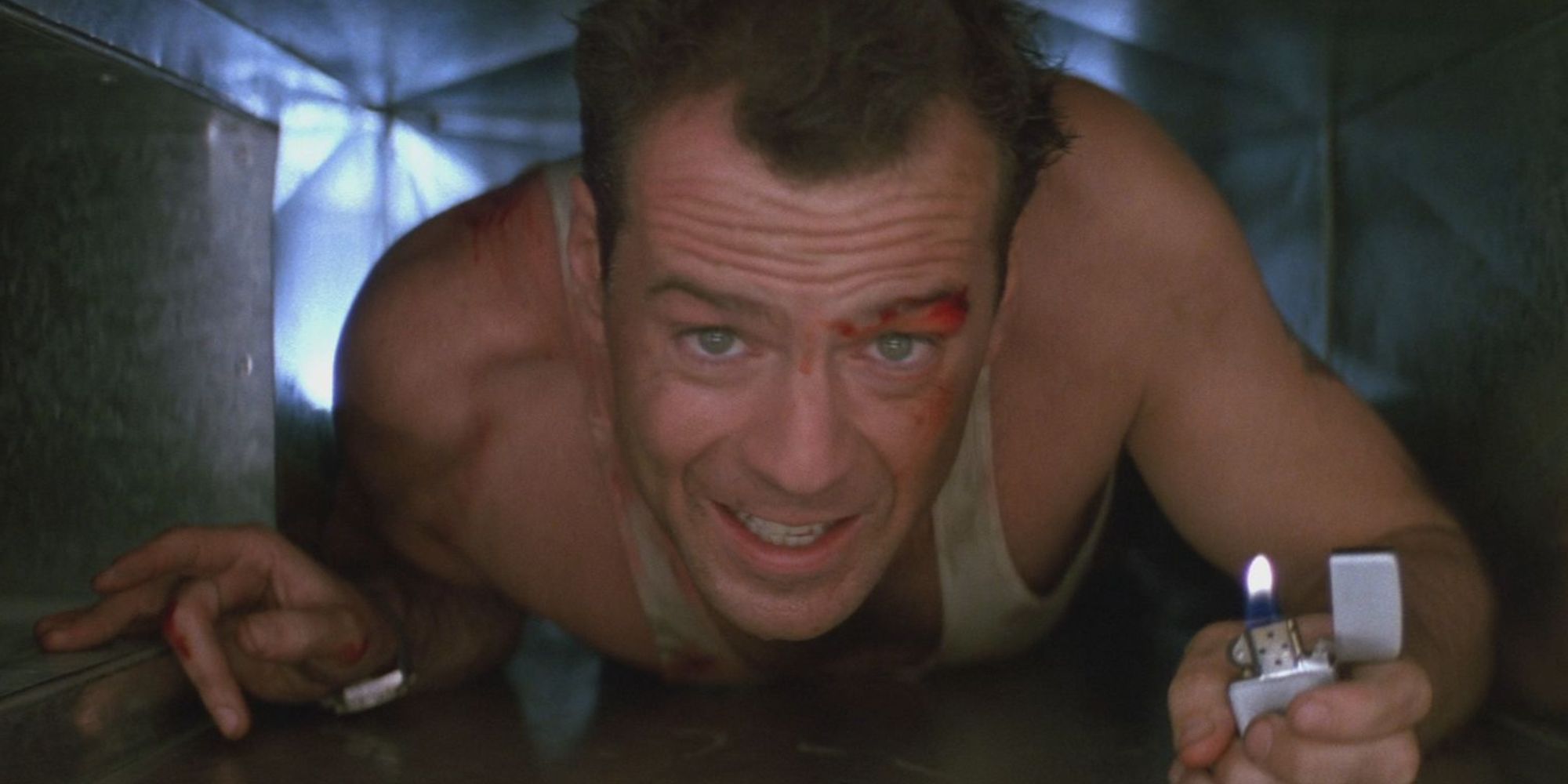 Bruce Willis como John McClane nos poços de ventilação em Duro de Matar