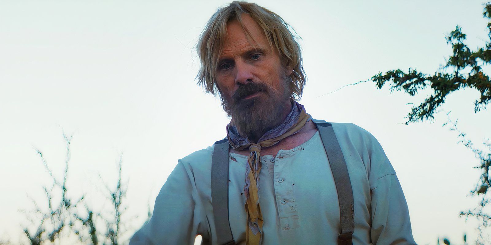 Viggo Mortensen looking down framed against the sky in The Dead Don’t Hurt